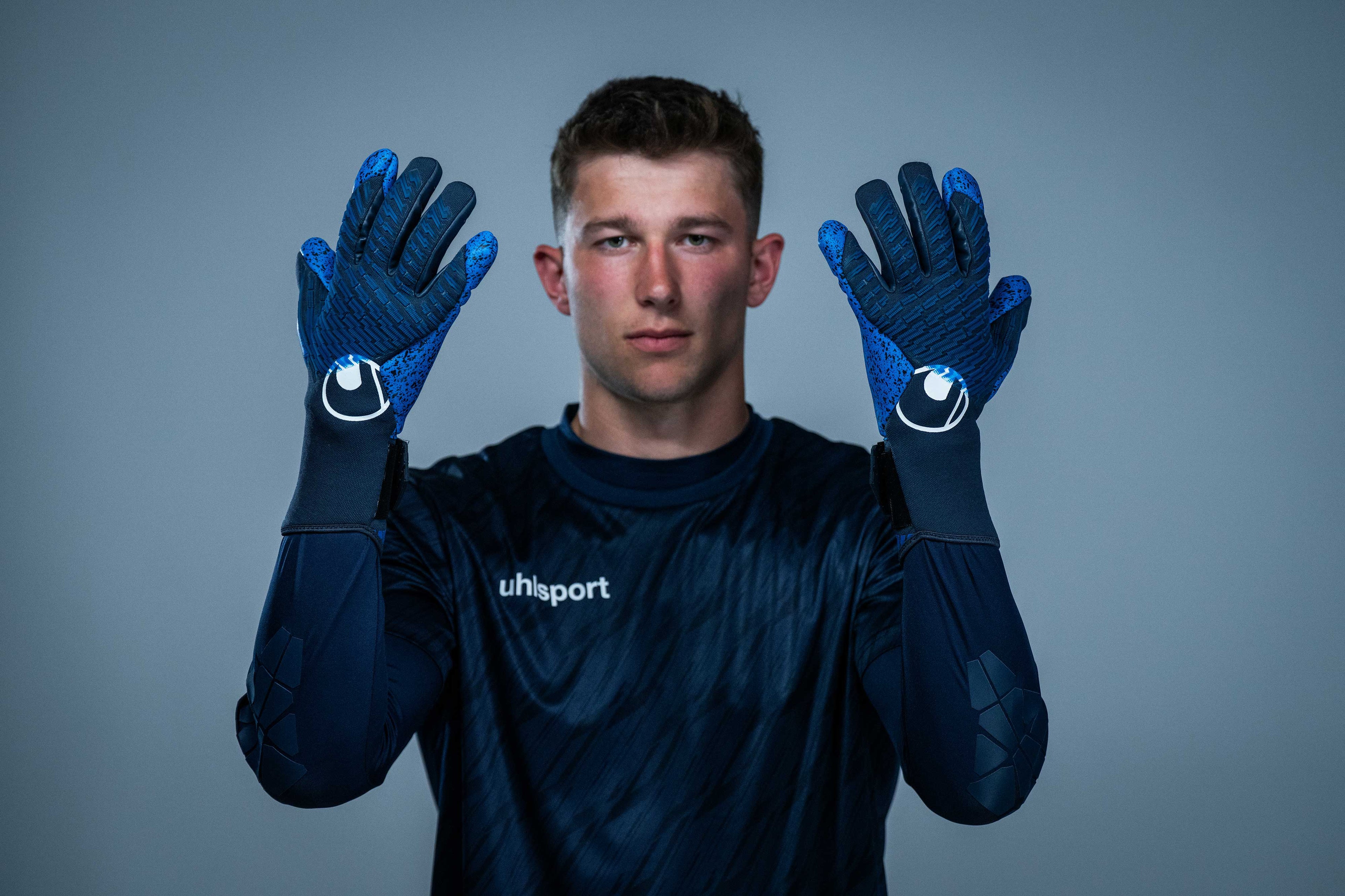 FM uhlsport Aquagrip HN navy/pacific blue/white
