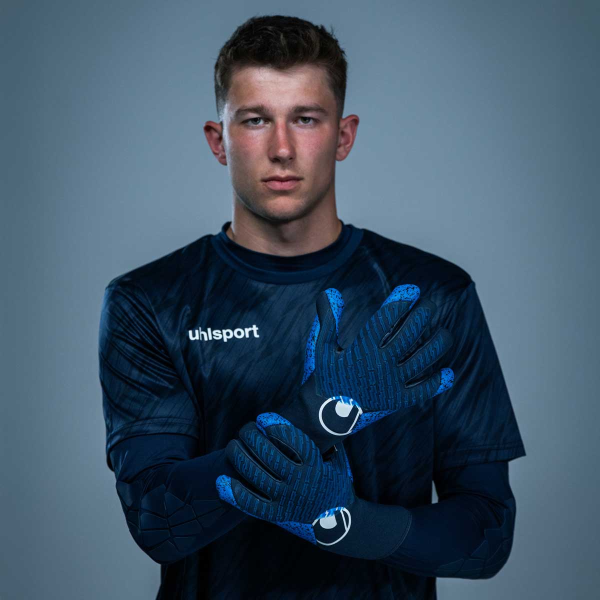 FM uhlsport Aquagrip HN navy/pacific blue/white