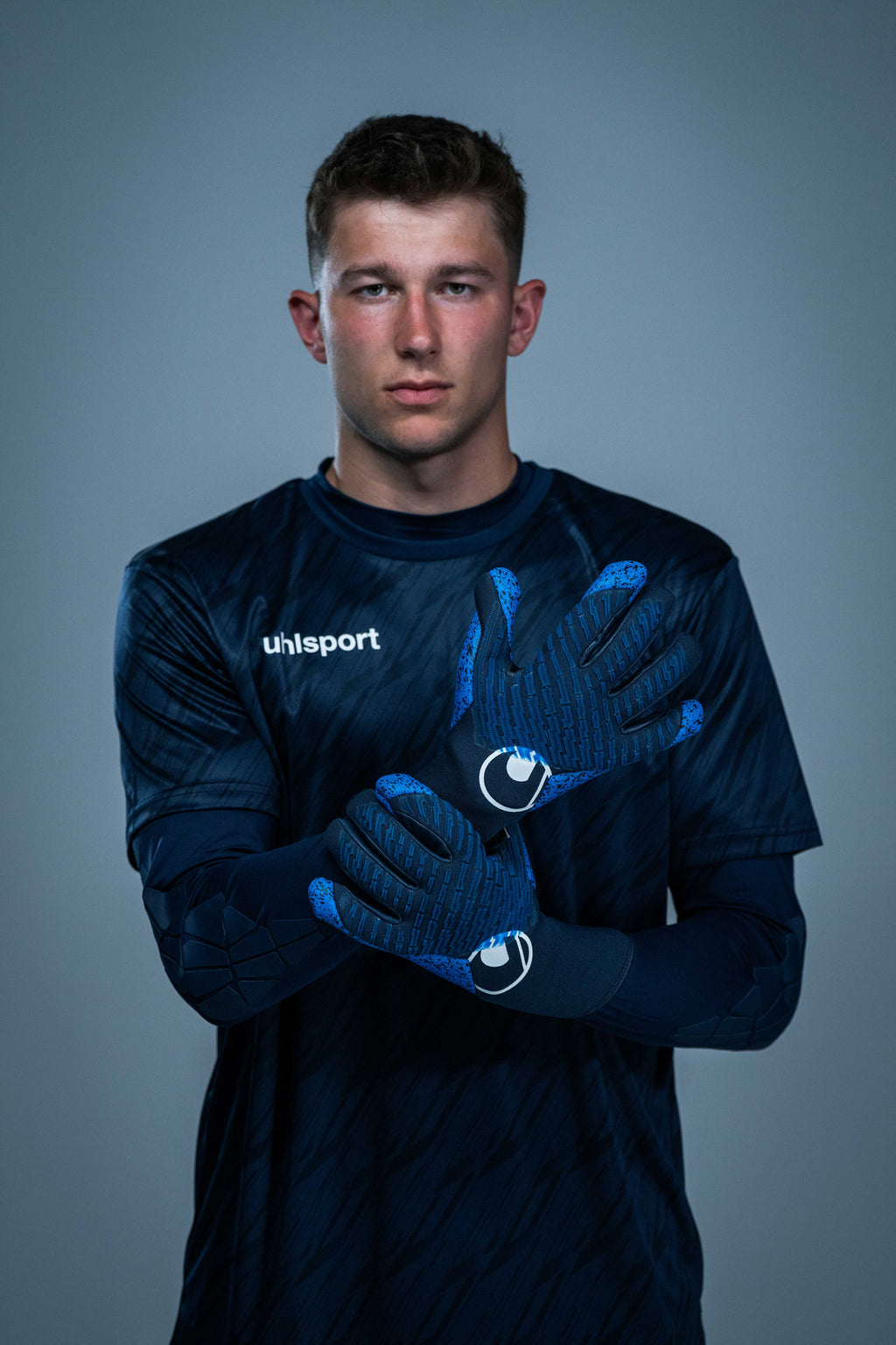 FM uhlsport Aquagrip HN navy/pacific blue/white